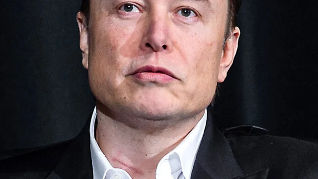 U.S. AIR FORCE ACADEMY, Colo. -- Tesla Inc. Chief Executive Officer Elon Musk speaks with Lt. Gen. Richard Clark, Superintendent of the U.S.