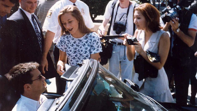 Actor Matthew Perry pictured in September 1995, surrounded by fans and paparazzi